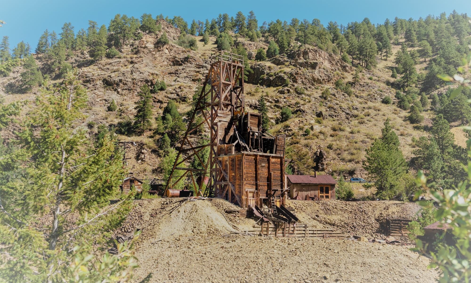 a low angled photo of a mountain where a gold mine once stood