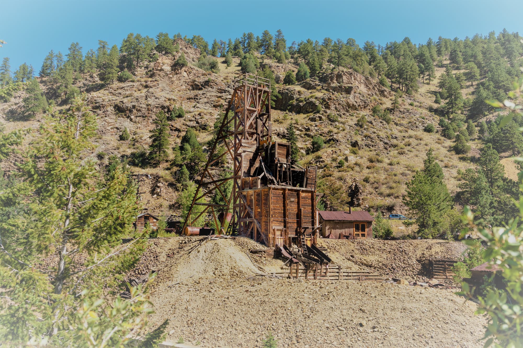 a low angled photo of a mountain where a gold mine once stood